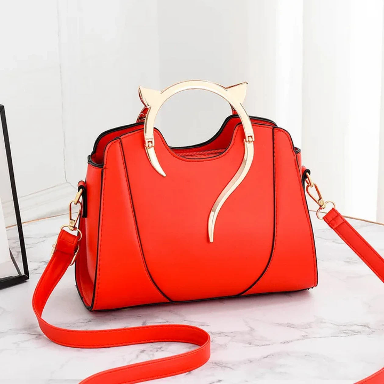 Red Handbag with Cat Ear Handle Design
